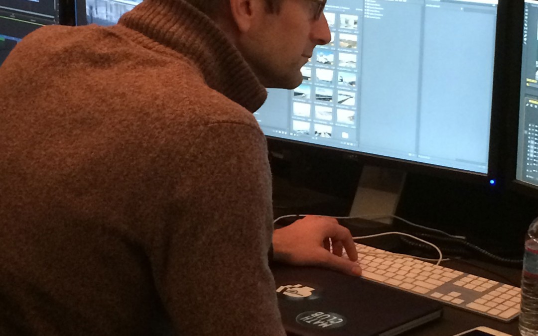 Producer Dylan Robertson working on final edits in the studio