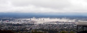 CHRISTCHURCH, NEW ZEALAND - FEBRUARY 22:  A panoramic view of Christchurch town centre taken from Port Hills is seen at 12:58, 7 minutes after the 6.3 magnitude struck central Christchurch at 12:51 on February 22, 2011 in Christchurch, New Zealand. The earthquake - an aftershock of the 7.1 magnitude quake on September 4 - struck 10km southeast of Christchurch with damage and fatalities far exceeding the initial quake. 181 people were killed, with nationals of over 20 countries among the victims.  (Photo by Gillian Needham/Getty Images)